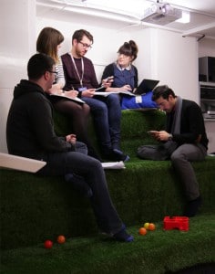 Group of Sleeping Giant Media execs working on task during Google Partner training session